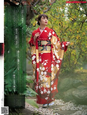 A woman in a kimono on the cover of a magazine.