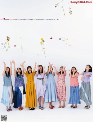 A group of young women posing for a magazine cover.
