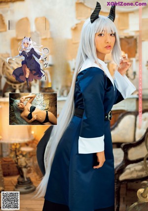 A woman in a blue and white outfit holding a wand.