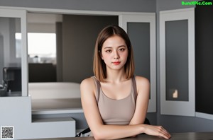 A woman standing in a kitchen next to a washing machine.